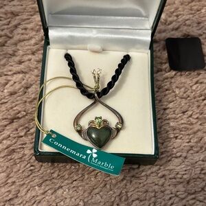 Connemara Sterling Silver Claddagh Pendant hangs on 18” cord